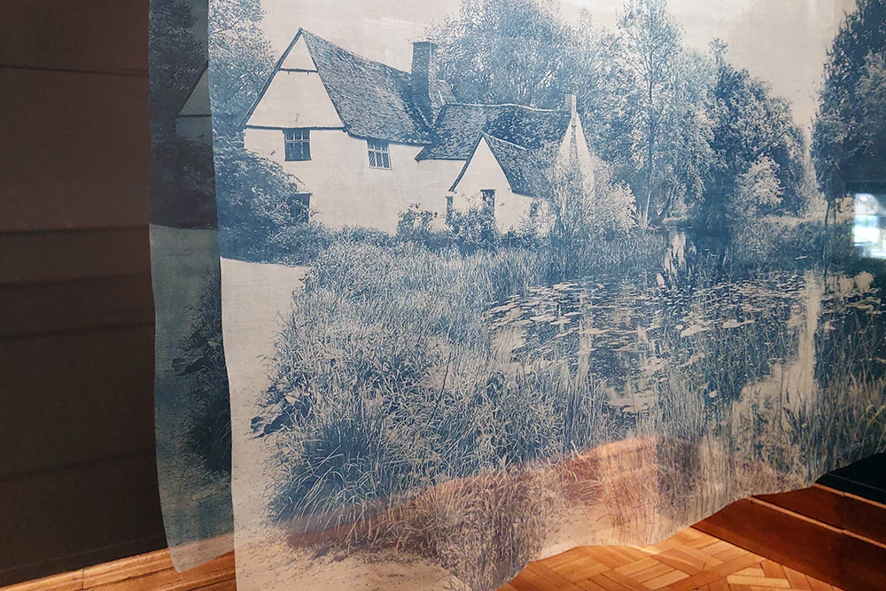 The Landscapes at Noon project, cyanotype images on silk of Willy Lott's house. On display at Christchurch Mansion, Ipswich in August 2022