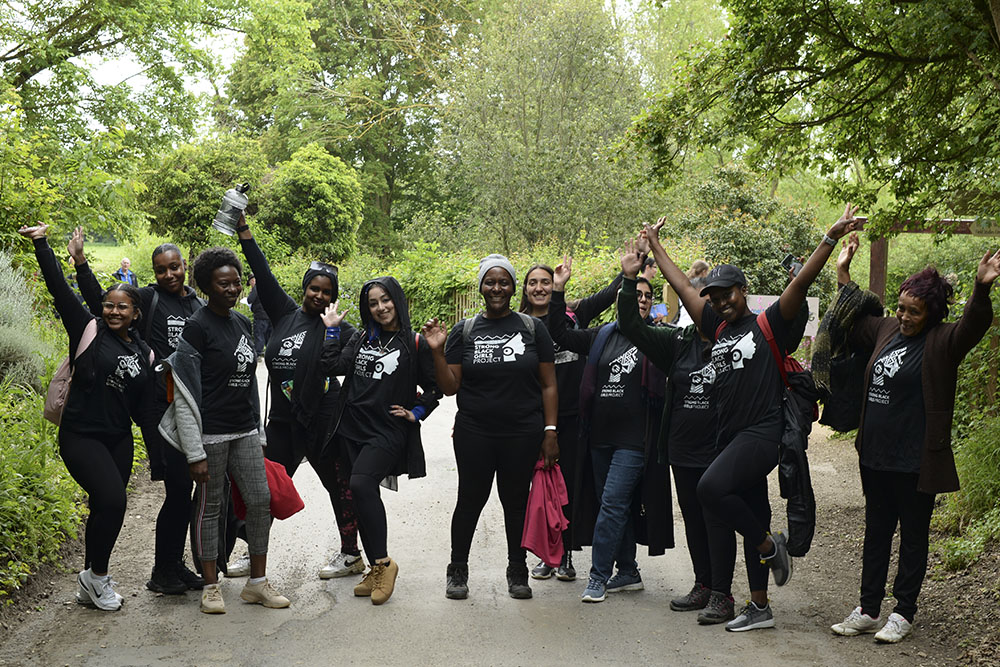 A group of women from P.H.O.E.B.E. celebrating their walk.