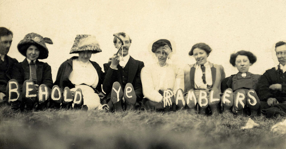 A historical photo of some ramblers with 'Behold Ye Ramblers' spelt out on the soles of their shoes. By kind permission of the Ramblers' Association